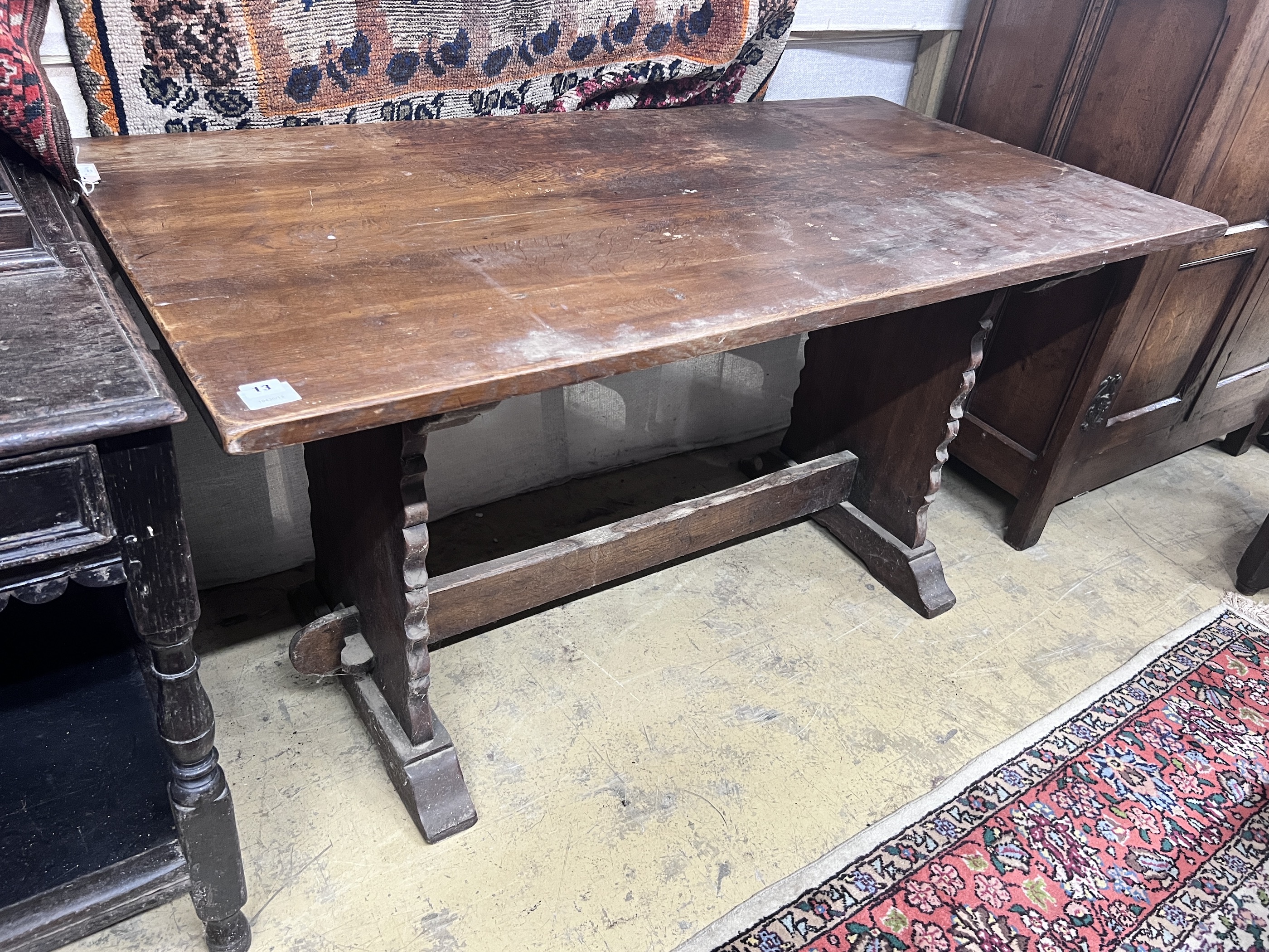 A 1920's rectangular oak dining table, length 145cm, depth 74cm, height 76cm